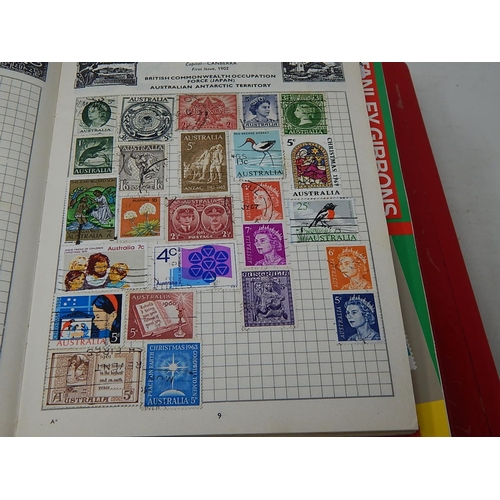 923 - Eleven Albums Containing a large Quantity of Worldwide Stamps.