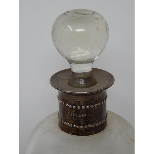 180 - Silver Mounted Glass Decanter: Hallmarked Sheffield by George Howson: Height 29cm