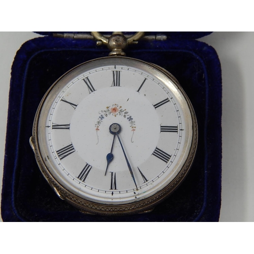 199 - Ladies Silver Key Wind Watch with White Enamel Floral Decorated Dial.