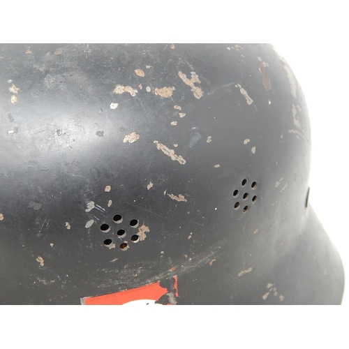 695 - WWII Nazi German Helmet with Inner Leather Head Lining: Later Decal to side.