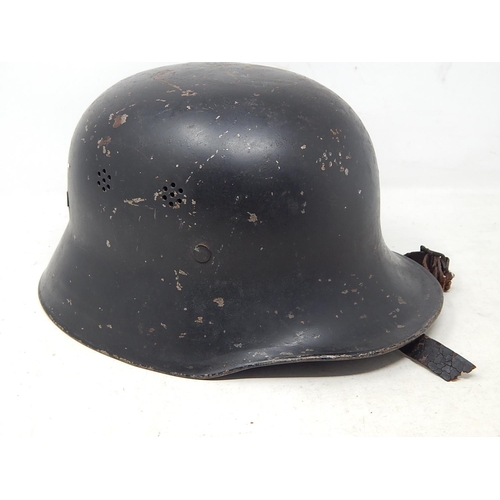 695 - WWII Nazi German Helmet with Inner Leather Head Lining: Later Decal to side.