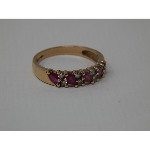 216 - 9ct Yellow Gold Ring Inset with Diamonds & Rubies: Ring Size L 1/2: Gross weight 2.2g