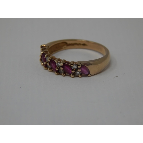 216 - 9ct Yellow Gold Ring Inset with Diamonds & Rubies: Ring Size L 1/2: Gross weight 2.2g