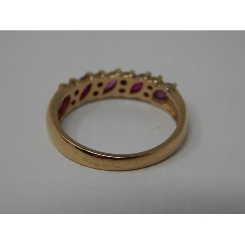 216 - 9ct Yellow Gold Ring Inset with Diamonds & Rubies: Ring Size L 1/2: Gross weight 2.2g