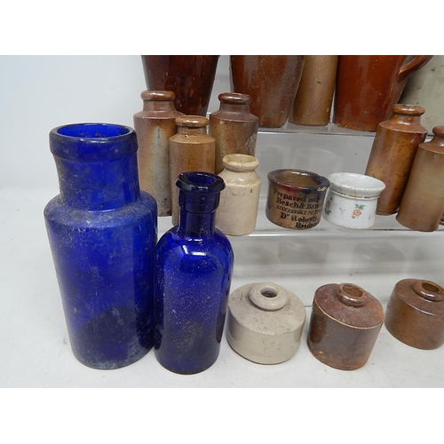 599 - Large Quantity of C19th & Early C20th Stoneware Bottles/Jugs together with two blue glass bottles.