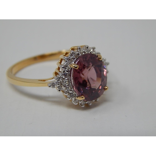 225 - 18ct Yellow Gold Ring Set with a Central Pink Zircon 4.13ct within a Diamond Border: Ring Size N: Gr... 