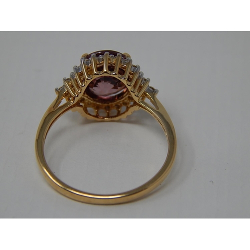 225 - 18ct Yellow Gold Ring Set with a Central Pink Zircon 4.13ct within a Diamond Border: Ring Size N: Gr... 