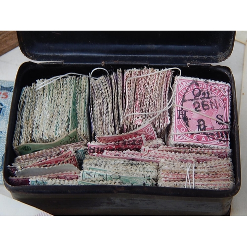 981 - Small Cash Tin Containing a Large Quantity of QV India Postage Stamps together with a quantity of Wo... 