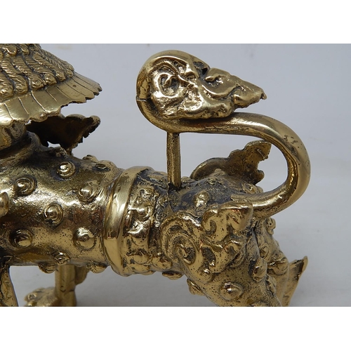 673 - Cast Brass Temple Dog: Measuring 20.5cm high x 21cm wide