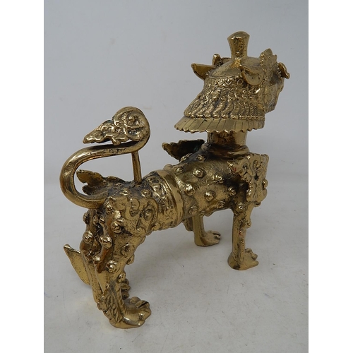 673 - Cast Brass Temple Dog: Measuring 20.5cm high x 21cm wide