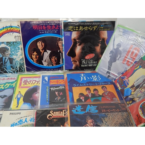 679 - A collection of 25 Japanese singles all in excellent condition and complete with lyric sheets from t... 