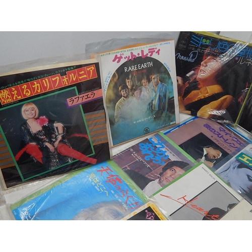 679 - A collection of 25 Japanese singles all in excellent condition and complete with lyric sheets from t... 