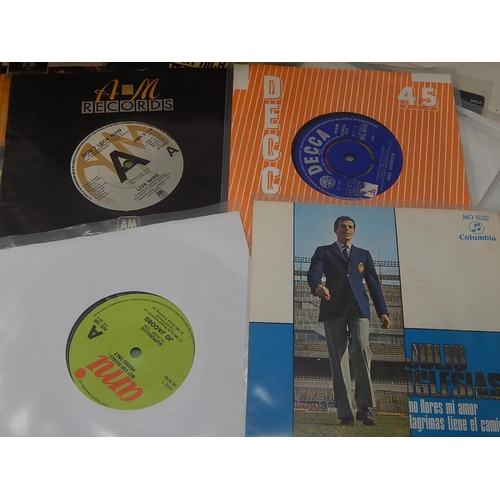 683 - A collection of 100 45rpm singles all housed in plastic sleeves and in great condition these singles... 