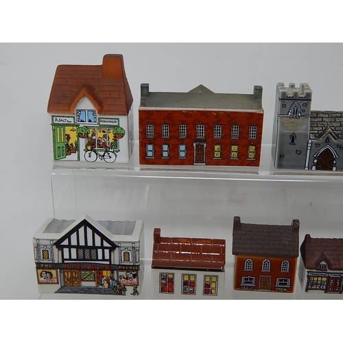 657 - Large Quantity of Wade Porcelain Houses & Shops (lot)