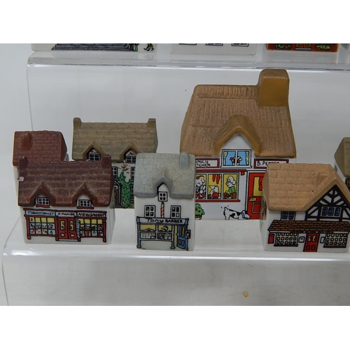 657 - Large Quantity of Wade Porcelain Houses & Shops (lot)