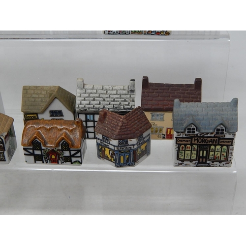 657 - Large Quantity of Wade Porcelain Houses & Shops (lot)