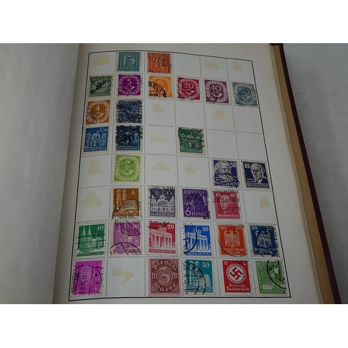 772 - Four Albums Containing a Large Quantity of World Stamps together with an Album of Russian Commemorat... 