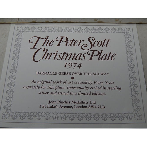 250 - The Peter Scott Silver Christmas Plate Hallmarked London 1974 by John Pinches: Measures 20cm diamete... 