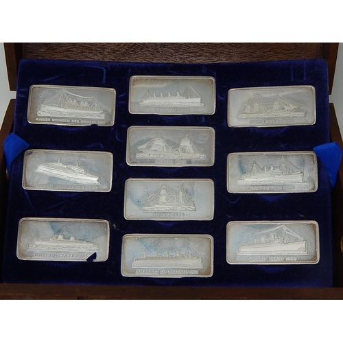 263 - Set of 20 Silver Ingots of Famous Atlantic liners Contained in Case of Issue Formed as a Treasure Ch... 