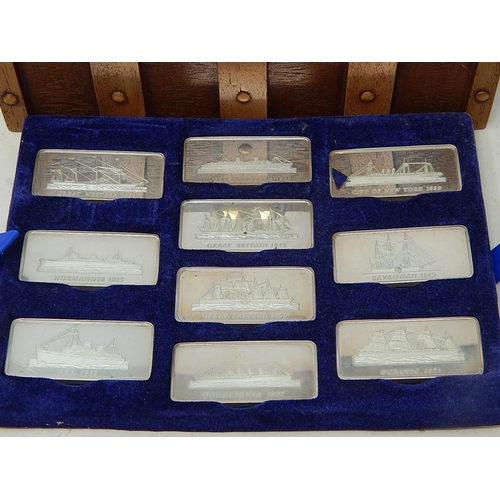 263 - Set of 20 Silver Ingots of Famous Atlantic liners Contained in Case of Issue Formed as a Treasure Ch... 