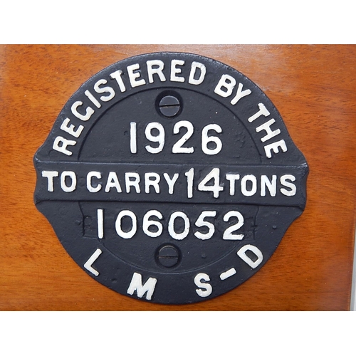 492 - Two L.M.S-D 1926 Railway Wagon Plaques 17.5cm diameter mounted on wooden boards for hanging.