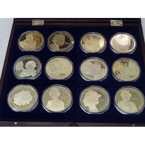 904 - Superb collection of 12 x 54g Proof Gold-plated medallions in presentation case with COA twinned wit... 