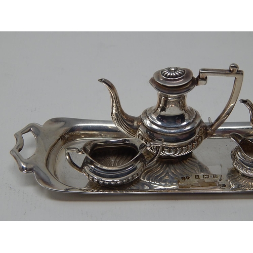 823 - A small sized Hallmarked Silver Tea Set and Tray