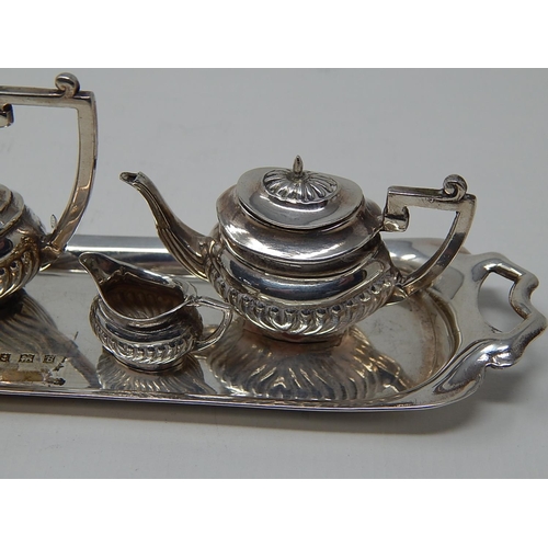 823 - A small sized Hallmarked Silver Tea Set and Tray