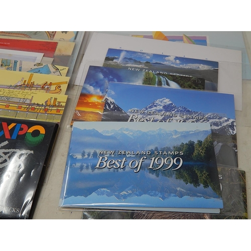 832 - A superb selection of World stamp presentation packs, etc (33) much Australia all superb and Mint as... 