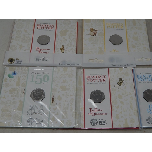 930 - Collection of 10 x Beatrix Potter 50p coins all different and about as struck housed in sealed Royal... 