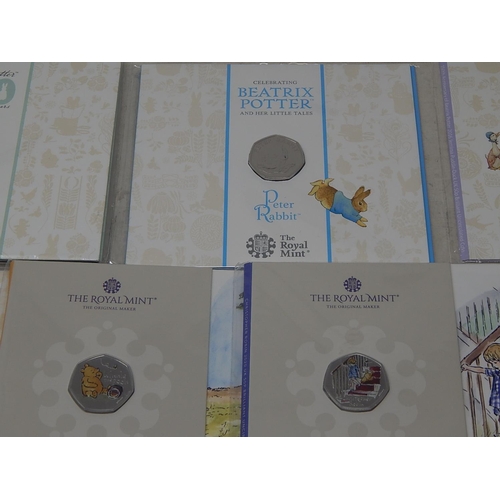 938 - Collection of 10 x 50p Commemorative Coins inc Coloured Classic Pooh, etc all Brilliant Uncirculated... 