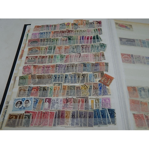 831 - An enormous collection of British Commonwealth and World stamps housed in a thick stockbook very ful... 