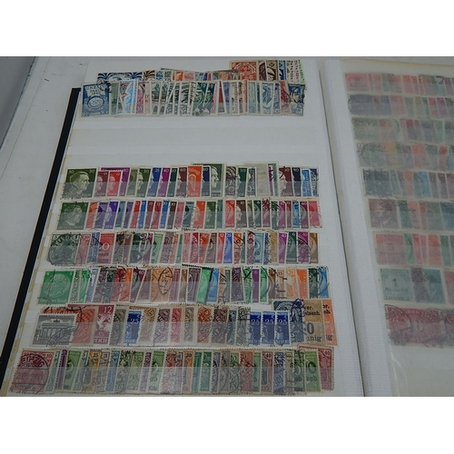 831 - An enormous collection of British Commonwealth and World stamps housed in a thick stockbook very ful... 