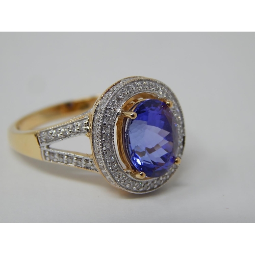 279 - 18ct Yellow Gold Tanzanite & Diamond Cluster Ring. The Central Tanzanite Measuring 3.00cts. The Diam... 