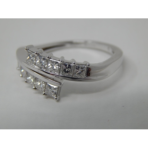 280 - Platinum Set 1.00ct Diamond Crossover Ring: The Diamonds G/H VS1: Ring Size P/Q: Platinum Weight 4.8... 