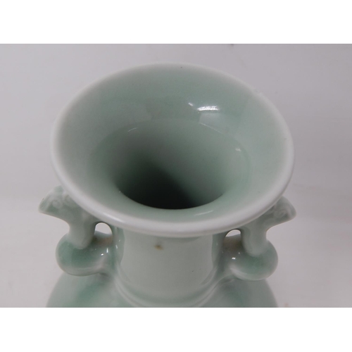 661 - Chinese Celadon Tapering Bulbous Vase with Twin Handles: The Base with Fine Yellow Rim: Measures 17.... 