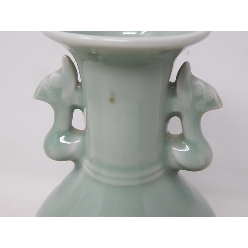 661 - Chinese Celadon Tapering Bulbous Vase with Twin Handles: The Base with Fine Yellow Rim: Measures 17.... 