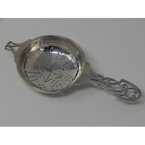 297 - Silver Tea Strainer: Hallmarked Sheffield 1947 by E. Silver & Co.