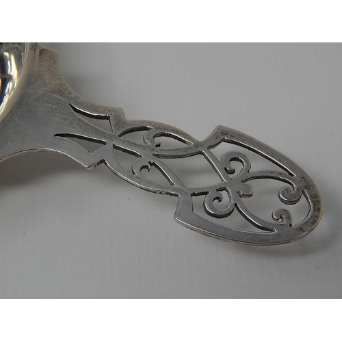 297 - Silver Tea Strainer: Hallmarked Sheffield 1947 by E. Silver & Co.