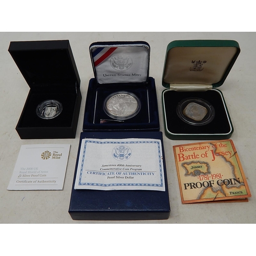 Jersey 1981 £1 Square Coin Silver Proof 1981; The 2008 UK Royal Shields of Arms £1 Silver Proof coin; USA Jamestown 400th Anniversary Proof Silver Dollar, some toning to the Jersey £1 otherwise brilliant, about as struck and all housed in their original cases of issue with COAs