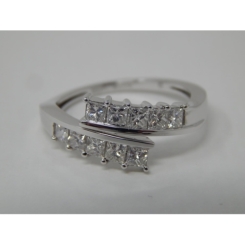 Platinum Set 1.00ct Diamond Crossover Ring: The Diamonds G/H VS1: Ring Size P/Q: Platinum Weight 4.85g