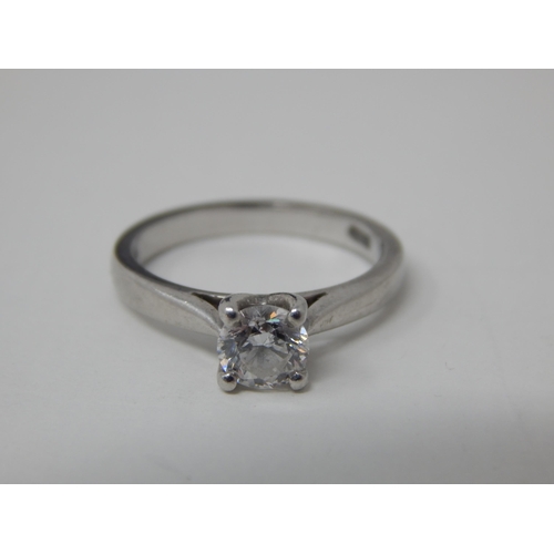 30 - Platinum & Diamond Solitaire Ring Set with a 0.61ct Diamond: Colour 
