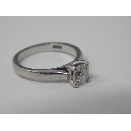 30 - Platinum & Diamond Solitaire Ring Set with a 0.61ct Diamond: Colour 