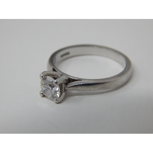 30 - Platinum & Diamond Solitaire Ring Set with a 0.61ct Diamond: Colour 