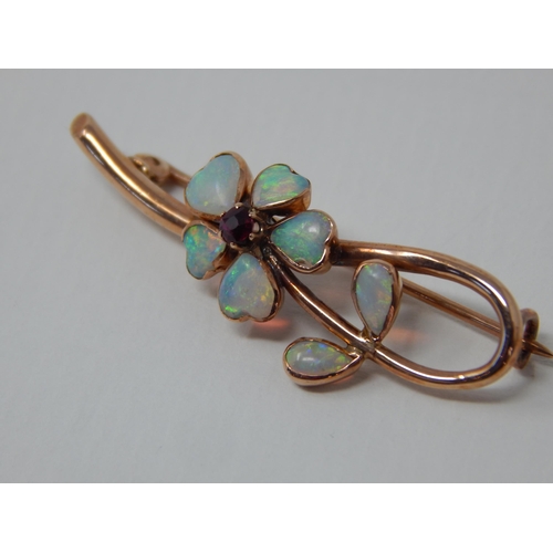 5 - 9ct Yellow Gold Brooch Formed with a Flower Head Set with Opals & a Central Garnet.