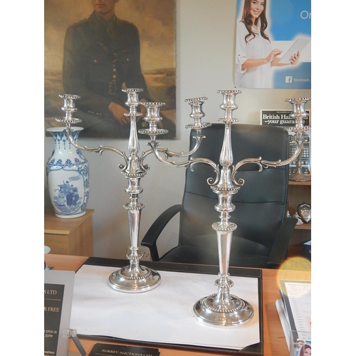 42 - A Superb Pair of Sterling Silver Three Branch Candelabra, weighted, not Hallmarked but tested as Ste... 