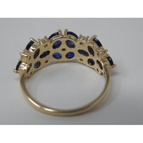 47 - 9ct Yellow Gold Ring Set with 2.75cts of Sapphires & 0.50cts of White Zircons: Ring Size N/O