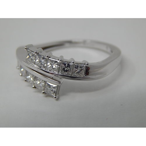 48 - Platinum Set 1.00ct Diamond Crossover Ring: The Diamonds G/H VS1: Ring Size P/Q: Platinum Weight 4.8... 