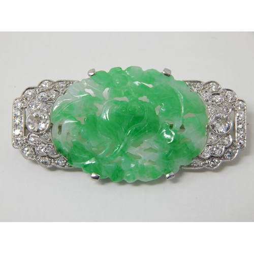 51 - Art Deco Diamond & Jade Brooch Mounted in Unmarked Platinum possibly by Cartier. The Oval Jade Panel... 