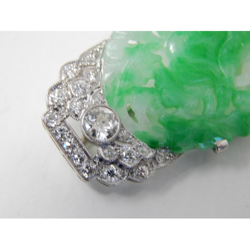 51 - Art Deco Diamond & Jade Brooch Mounted in Unmarked Platinum possibly by Cartier. The Oval Jade Panel... 